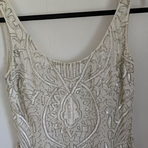 White beaded cocktail dress by Aidan Mattox